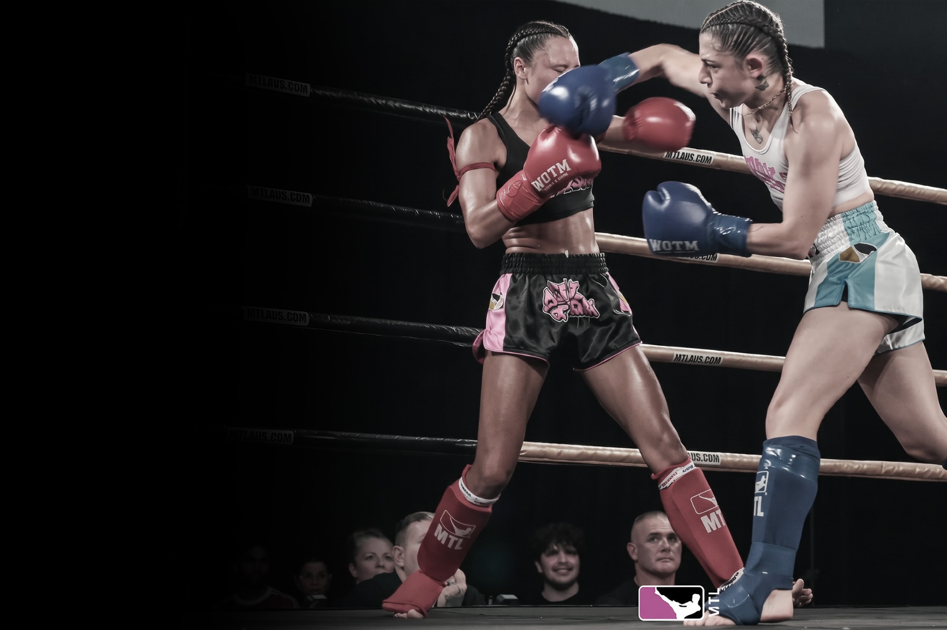 Women's Muay Thai bout in the ring